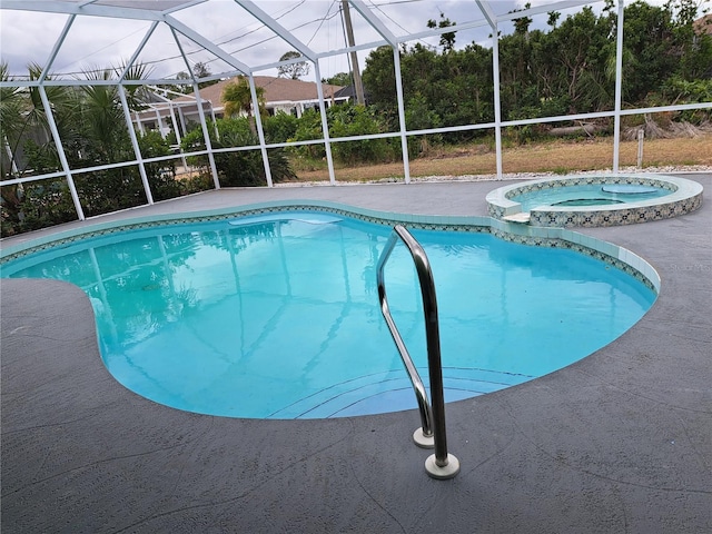 26 Clintwood Ave, Englewood, FL 34223 - view of pool featuring a lanai, a patio area, and a pool with connected hot tub