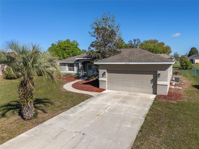 4575 NW 30th Pl, Ocala, FL 34482 - ranch-style home with stucco siding, a garage, a front lawn, and concrete driveway