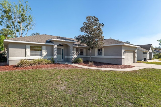 4575 NW 30th Pl, Ocala, FL 34482 - ranch-style house featuring driveway, a front yard, an attached garage, and stucco siding