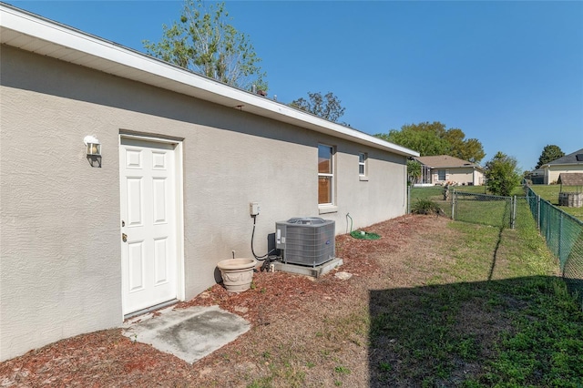 4575 NW 30th Pl, Ocala, FL 34482 - view of yard featuring central AC unit and fence