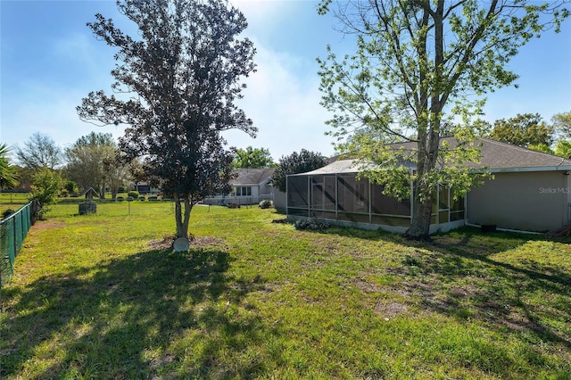 4575 NW 30th Pl, Ocala, FL 34482 - view of yard featuring glass enclosure and fence private yard