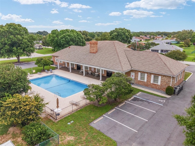 4575 NW 30th Pl, Ocala, FL 34482 - outdoor pool featuring a fenced backyard, a yard, and a patio area