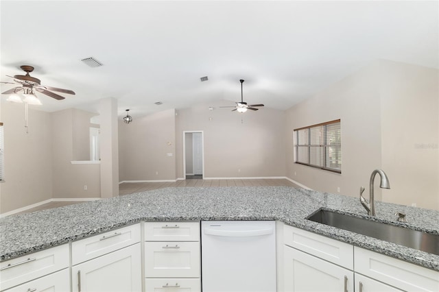 4575 NW 30th Pl, Ocala, FL 34482 - kitchen with vaulted ceiling, a sink, white cabinetry, dishwasher, and ceiling fan