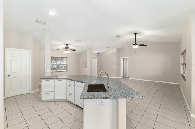 4575 NW 30th Pl, Ocala, FL 34482 - kitchen with dishwasher, light tile patterned floors, a sink, and ceiling fan