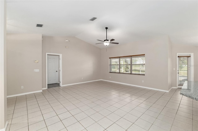 4575 NW 30th Pl, Ocala, FL 34482 - spare room featuring baseboards, ceiling fan, visible vents, and vaulted ceiling