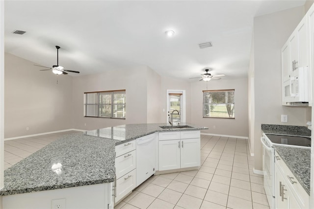 4575 NW 30th Pl, Ocala, FL 34482 - kitchen featuring visible vents, a sink, a ceiling fan, and white appliances
