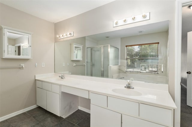 4575 NW 30th Pl, Ocala, FL 34482 - bathroom with a shower stall, double vanity, baseboards, and a sink