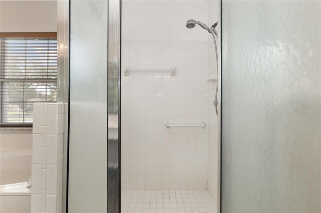 4575 NW 30th Pl, Ocala, FL 34482 - full bathroom featuring a bath and a shower stall