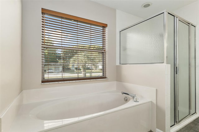 4575 NW 30th Pl, Ocala, FL 34482 - full bath with a stall shower and a garden tub
