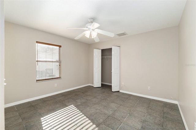 4575 NW 30th Pl, Ocala, FL 34482 - unfurnished bedroom with baseboards, ceiling fan, visible vents, and a closet