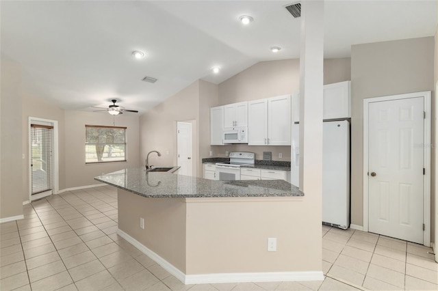 4575 NW 30th Pl, Ocala, FL 34482 - kitchen with a ceiling fan, white appliances, light tile patterned floors, visible vents, and white cabinets