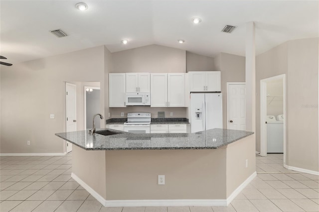 4575 NW 30th Pl, Ocala, FL 34482 - kitchen featuring washer and clothes dryer, white appliances, light tile patterned floors, a sink, and visible vents