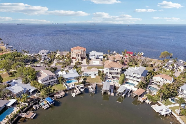 104 Carlyle Cir, Palm Harbor, FL 34683 - aerial overview of property's location featuring a large body of water and nearby suburban area