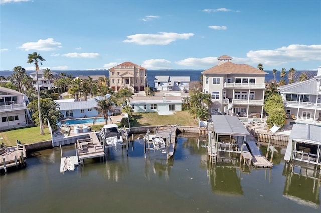 104 Carlyle Cir, Palm Harbor, FL 34683 - dock area featuring boat lift and a water view