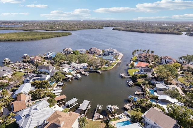 104 Carlyle Cir, Palm Harbor, FL 34683 - aerial view of residential area featuring a large body of water