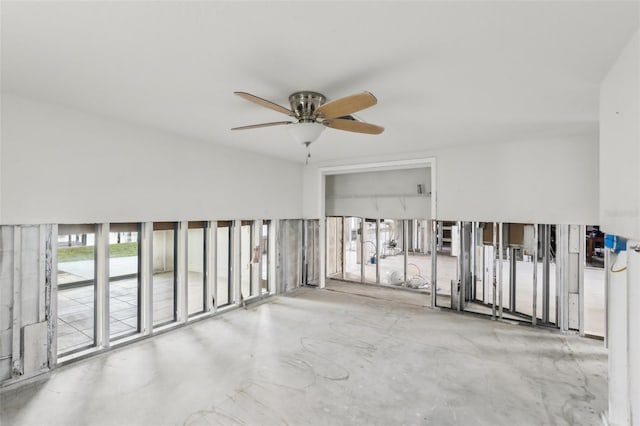 104 Carlyle Cir, Palm Harbor, FL 34683 - unfurnished room featuring a ceiling fan and concrete floors