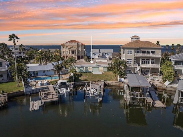 104 Carlyle Cir, Palm Harbor, FL 34683 - dock area with boat lift and a water view