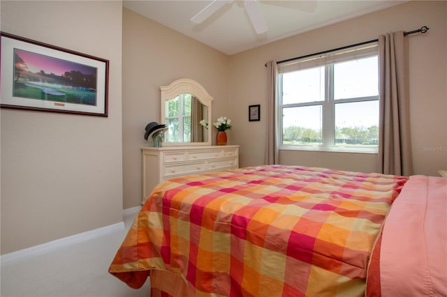 bedroom featuring baseboards, carpet, and a ceiling fan
