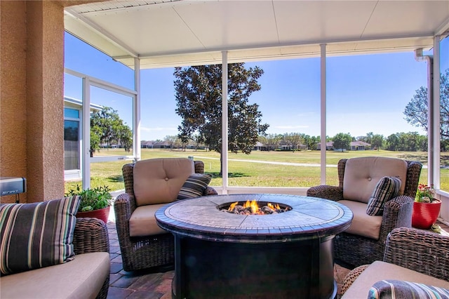 sunroom with a fire pit