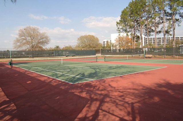 view of sport court with fence and community basketball court