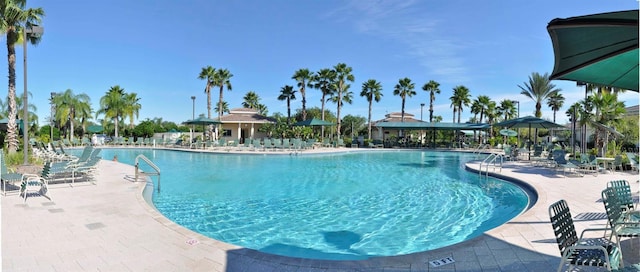 pool with a patio area