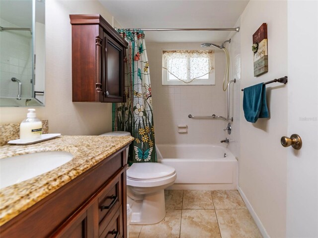 5427 Springwood Blvd Unit 5427, Pinellas Park, FL 33782 - bathroom with tile patterned flooring, vanity, shower / bath combo with shower curtain, toilet, and baseboards