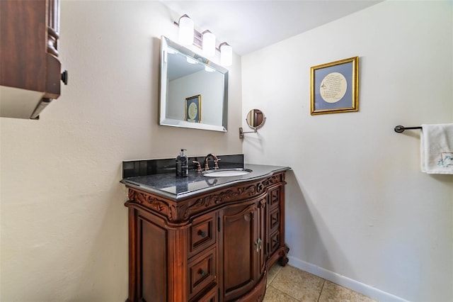 5427 Springwood Blvd Unit 5427, Pinellas Park, FL 33782 - bathroom with tile patterned floors, baseboards, and vanity