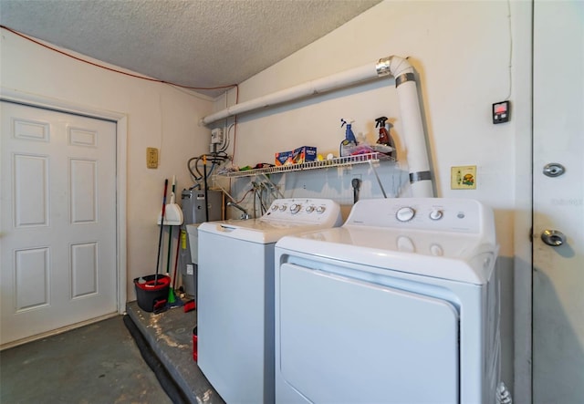 5427 Springwood Blvd Unit 5427, Pinellas Park, FL 33782 - laundry area with laundry area, a textured ceiling, and washer and clothes dryer