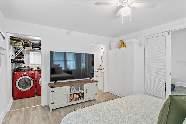 819 11th St N, Saint Petersburg, FL 33705 - bedroom featuring a ceiling fan, separate washer and dryer, light wood-style floors, and connected bathroom