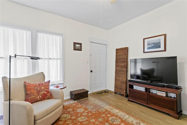 819 11th St N, Saint Petersburg, FL 33705 - sitting room with baseboards and light wood-style floors