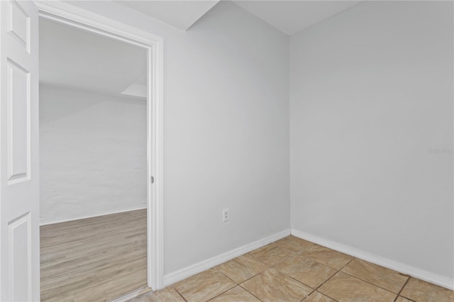 819 11th St N, Saint Petersburg, FL 33705 - spare room featuring baseboards