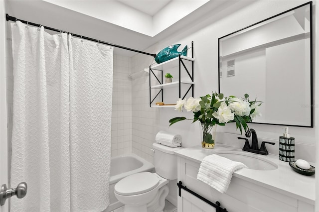 2650 Countryside Blvd Unit B102, Clearwater, FL 33761 - bathroom featuring vanity, toilet, shower / bathtub combination with curtain, and visible vents