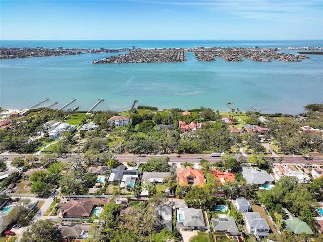 bird's eye view with a water view and a residential view