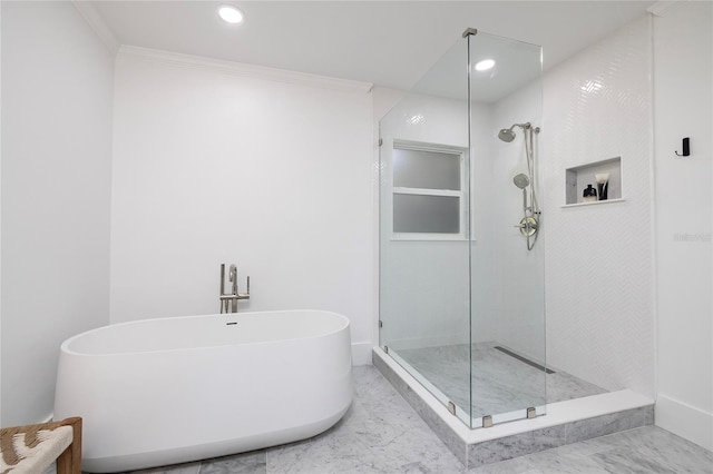 bathroom featuring a walk in shower, recessed lighting, a soaking tub, and marble finish floor