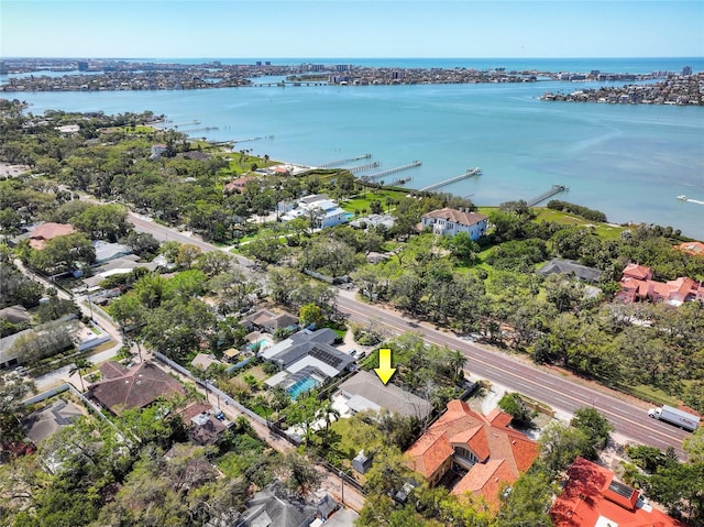 bird's eye view with a water view and a residential view