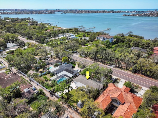 bird's eye view with a residential view and a water view