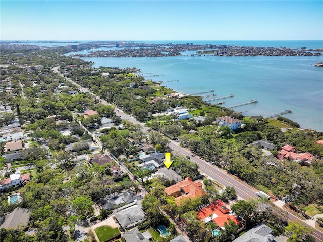birds eye view of property featuring a water view and a residential view