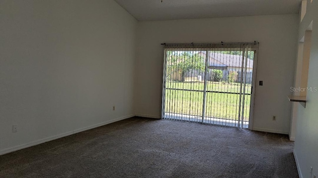 carpeted empty room with baseboards