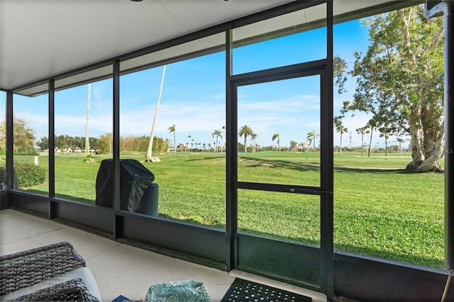 6140 Sun Blvd Unit 7, Saint Petersburg, FL 33715 - unfurnished sunroom with golf course view and healthy amount of natural light
