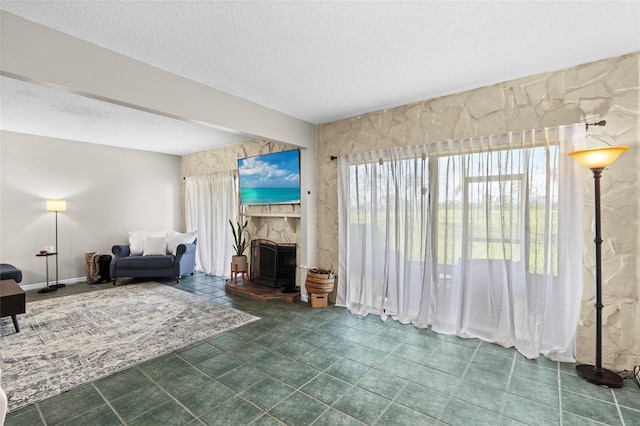 6140 Sun Blvd Unit 7, Saint Petersburg, FL 33715 - living area featuring a textured ceiling