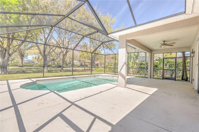 outdoor pool featuring a patio area, a lanai, and ceiling fan