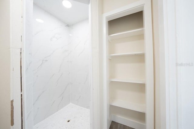 7322 Mako Dr, Hudson, FL 34667 - full bath featuring recessed lighting, a stall shower, and a walk in closet