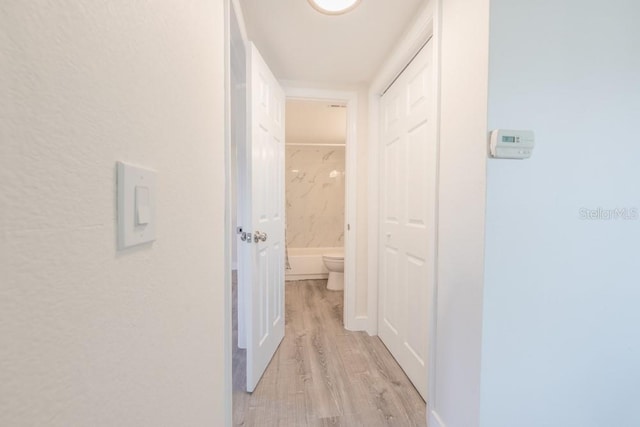 7322 Mako Dr, Hudson, FL 34667 - hall with light wood-style flooring