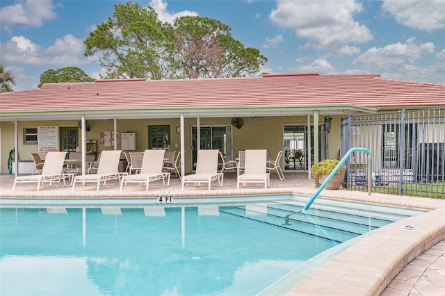 4885 1st St NE Unit 305, Saint Petersburg, FL 33703 - pool with a patio area and fence