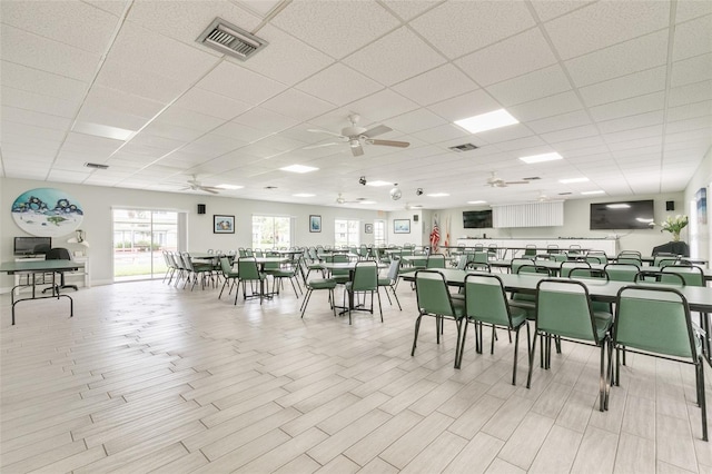 4885 1st St NE Unit 305, Saint Petersburg, FL 33703 - dining room featuring visible vents and a ceiling fan