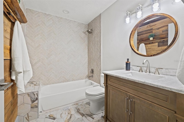 bathroom featuring toilet, shower / tub combination, and vanity