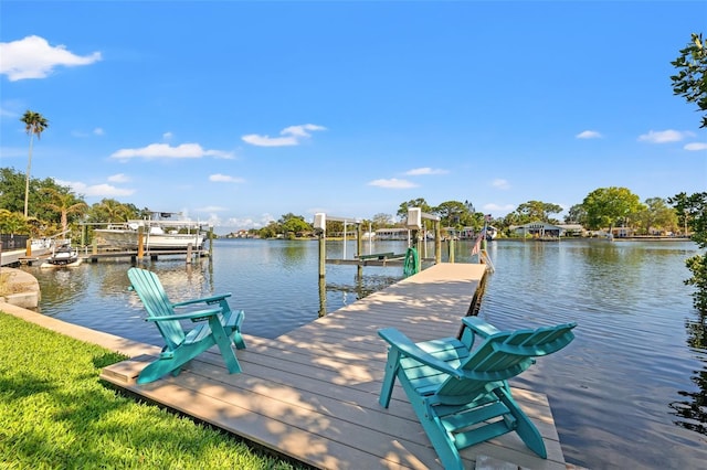 dock area featuring a water view and boat lift