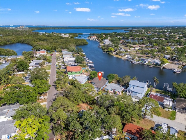 bird's eye view with a water view and a residential view