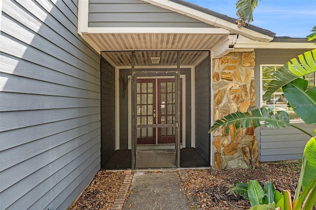 1366 Wexford Dr N, Palm Harbor, FL 34683 - view of exterior entry with stone siding