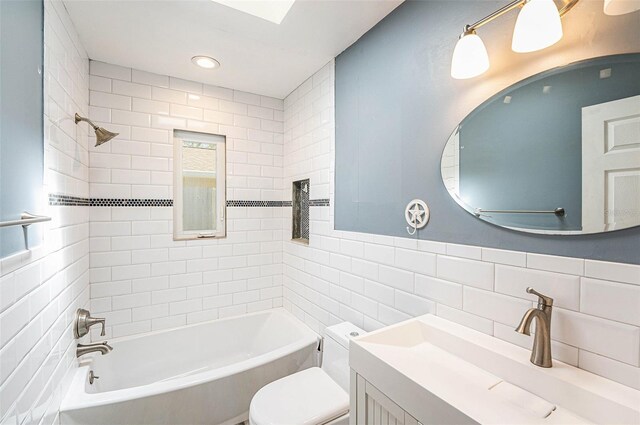 1366 Wexford Dr N, Palm Harbor, FL 34683 - full bath with vanity, recessed lighting, tile walls, toilet, and shower / bathtub combination